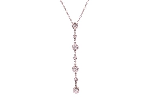 Lot 316 - Tiffany & Co. - a diamond-set pendant necklace...