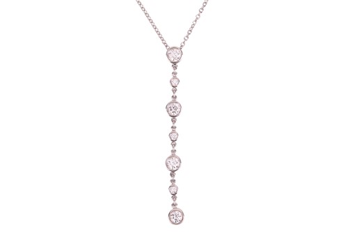 Lot 316 - Tiffany & Co. - a diamond-set pendant necklace...