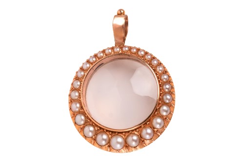 Lot 5 - A Victorian locket pendant set with split...