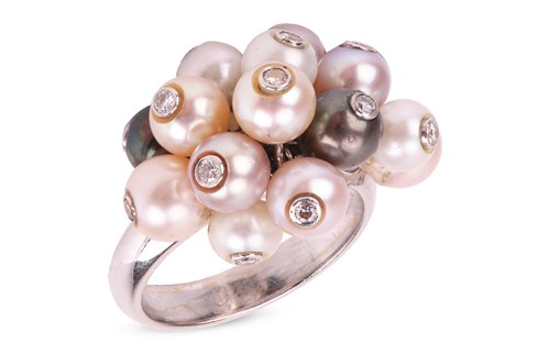 Lot 118 - A pearl and diamond-set cluster ring, composed...