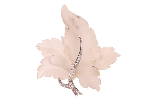 Lot 48 - A carved rock crystal maple leaf brooch, the...