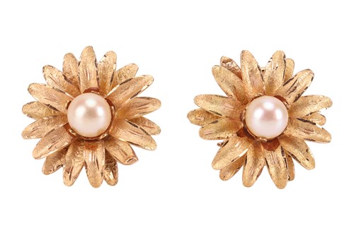 Lot 73 - A pair of pearl-set daisy clip-on earrings,...