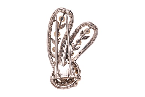 Lot 33 - An Edwardian pearl and diamond brooch, in the...