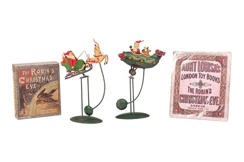 Lot 29 - Two vintage Christmas folk art pendulum...