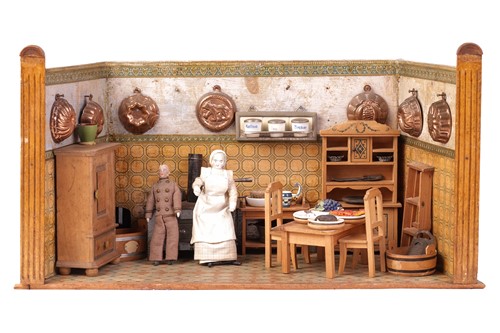 Lot 23 - A late 19th or early 20th century doll's house...