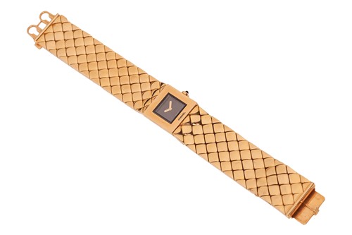 Lot Chanel - A Lady’s 18ct Gold Matelassé Bracelet...