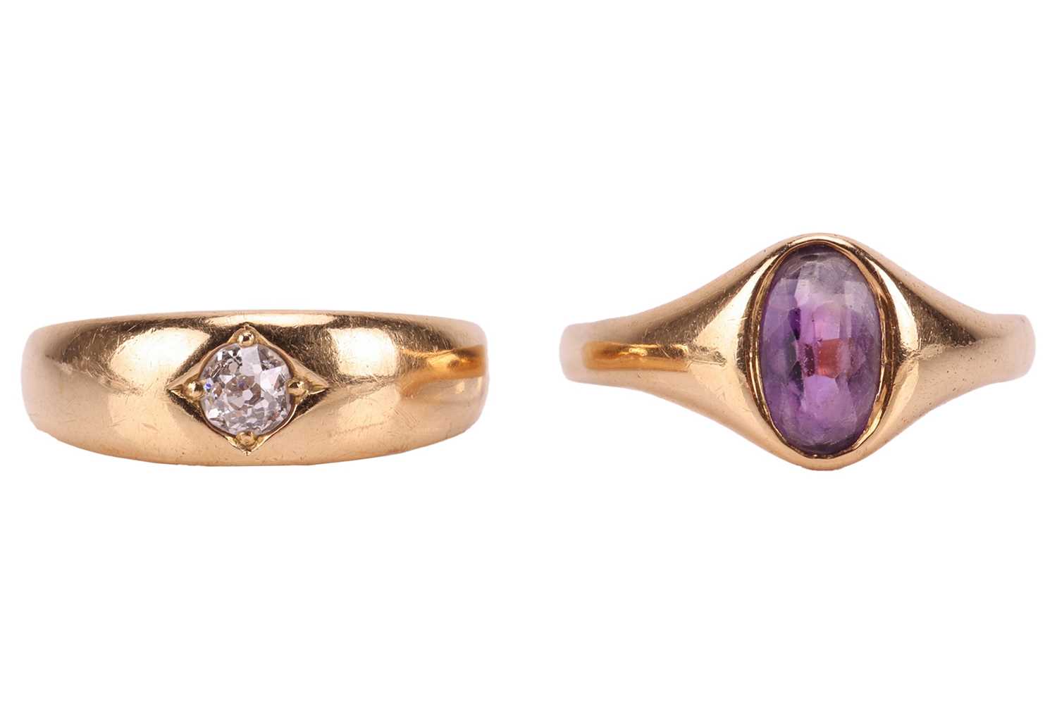 Lot 15 - Two gem-set gypsy rings in 18ct gold; the...