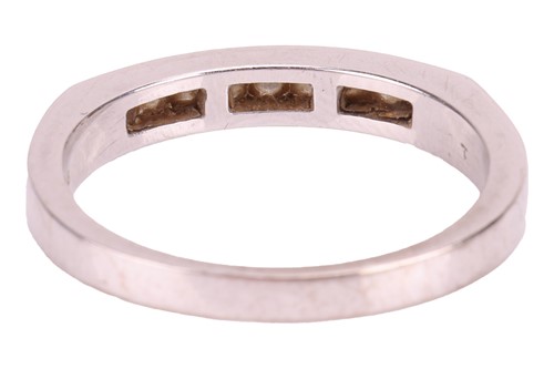 Lot 92 - A diamond half-eternity ring, featuring nine...