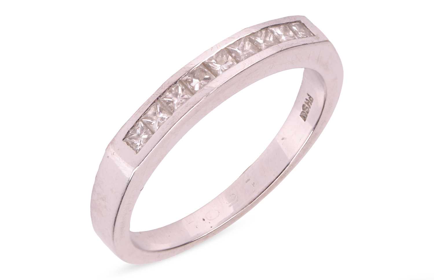 Lot 92 - A diamond half-eternity ring, featuring nine...