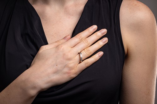 Lot 92 - A diamond half-eternity ring, featuring nine...