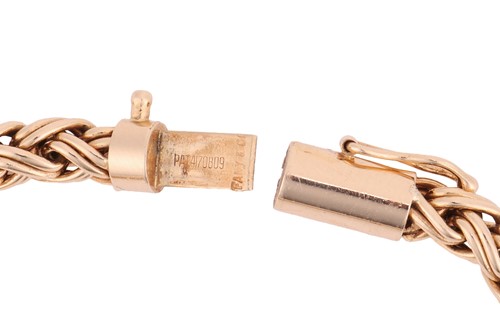 Lot 59 - Tiffany & Co. - A braided bracelet, of woven...