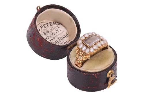 Lot 4 - A George IV mourning ring set with split...