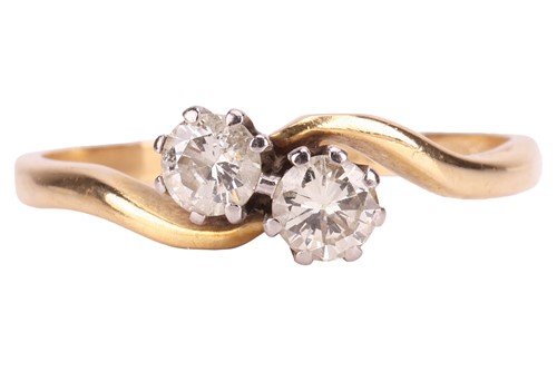 Lot 77 - A diamond-set Toi et Moi ring, featuring two...
