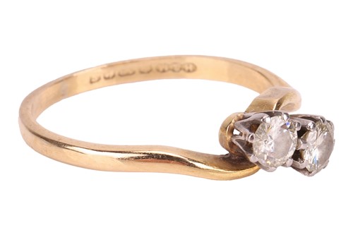 Lot 77 - A diamond-set Toi et Moi ring, featuring two...