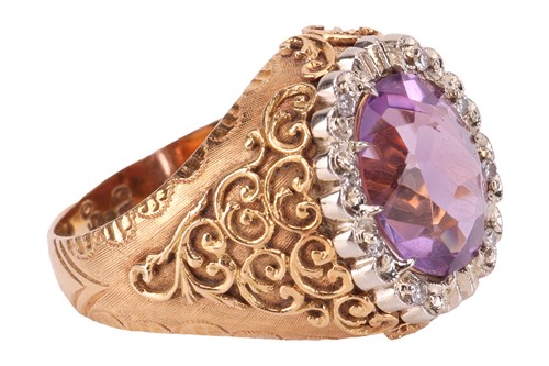 Lot 54 - Carl Bucherer - An amethyst dress ring,...