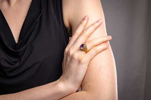 Lot 54 - Carl Bucherer - An amethyst dress ring,...