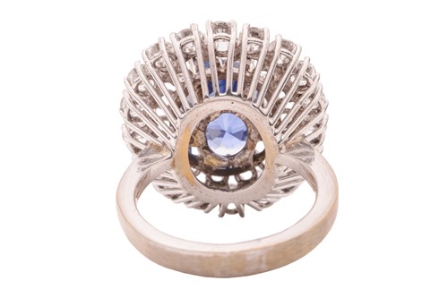 Lot 100 - An unheated Ceylon sapphire and diamond...