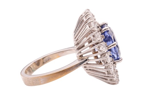 Lot 100 - An unheated Ceylon sapphire and diamond...