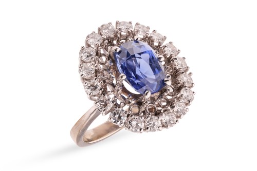 Lot 100 - An unheated Ceylon sapphire and diamond...