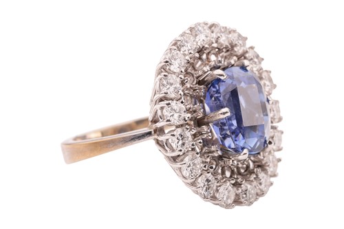 Lot 100 - An unheated Ceylon sapphire and diamond...