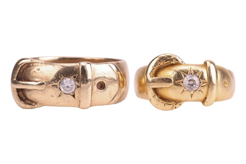 Lot 11 - Two gold buckle rings; the first star-set with...