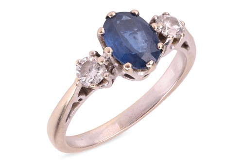 Lot 117 - A sapphire and diamond-set three-stone ring,...