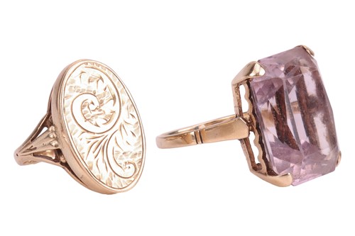 Lot 34 - Two rings; comprising an amethyst-set cocktail...