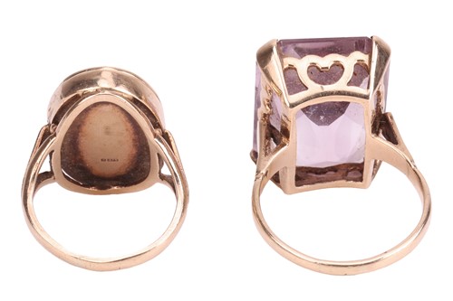 Lot 34 - Two rings; comprising an amethyst-set cocktail...