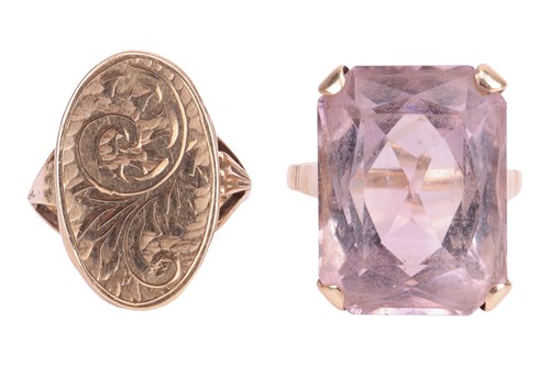 Lot 34 - Two rings; comprising an amethyst-set cocktail...