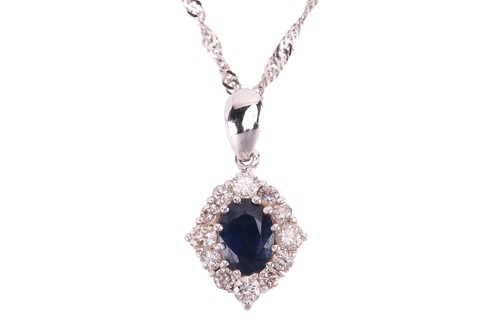 Lot 151 - A sapphire and diamond-set cluster pendant,...