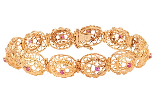 Lot 124 - A pink sapphire-set filigree bracelet, the...