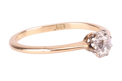 Lot 13 - A diamond solitaire ring, featuring a central...