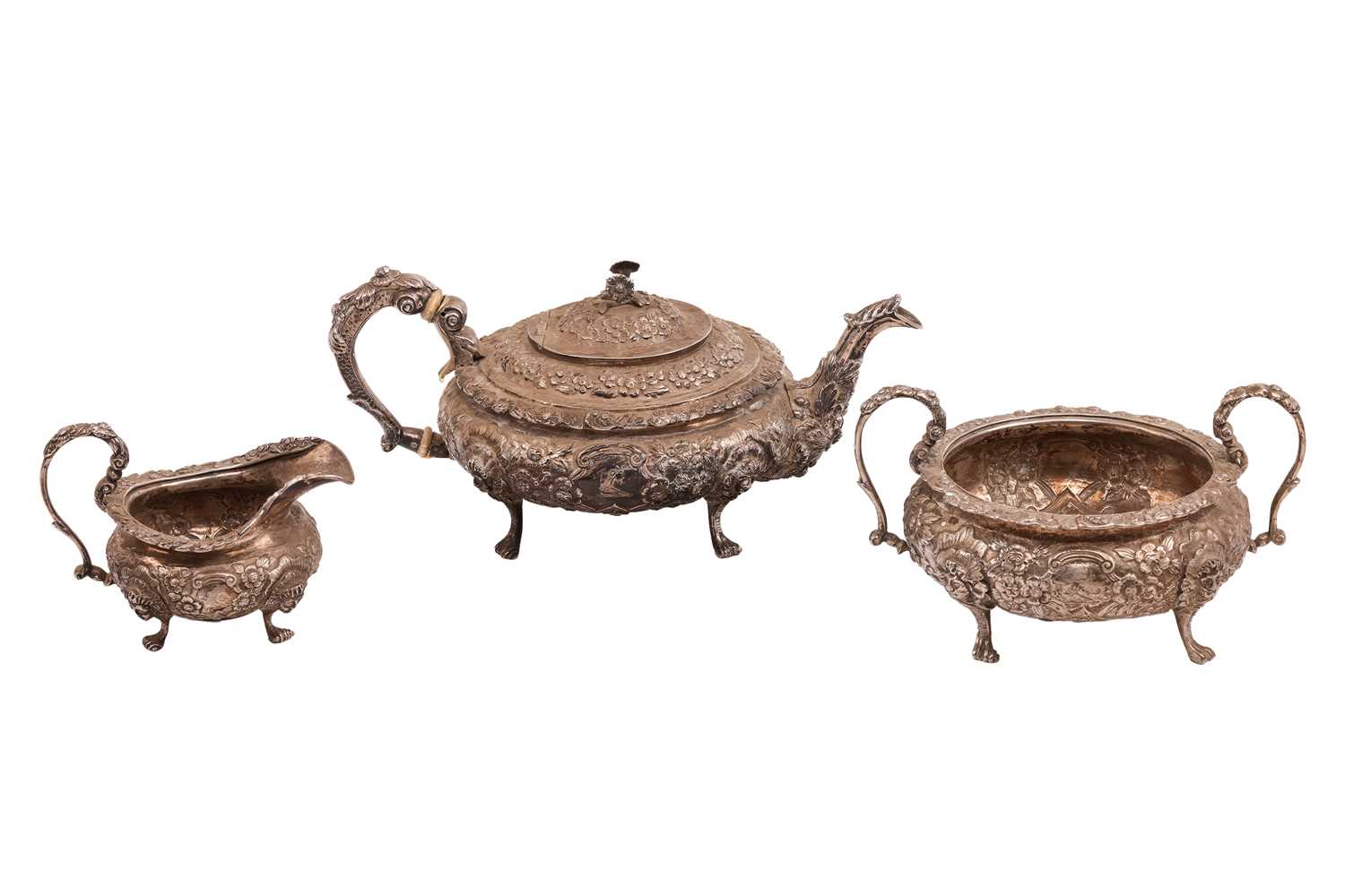 Lot 232 - A heavy-gauge Irish silver three-piece tea set,...