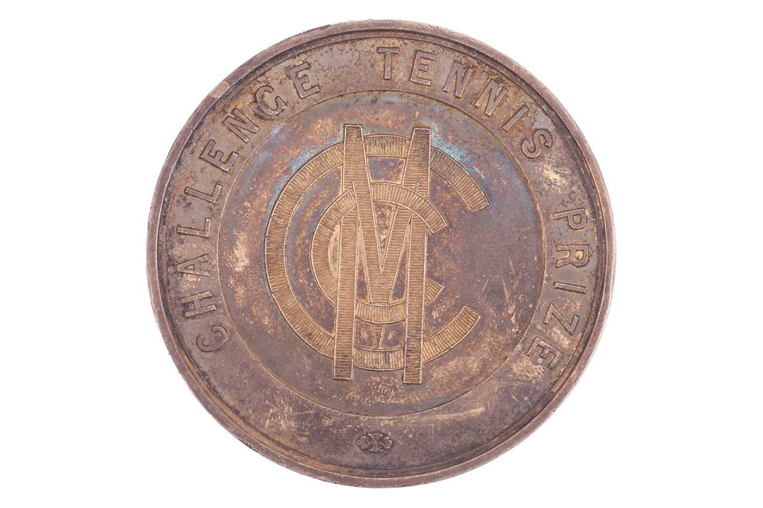 Lot A gold-plated medal presented to Alfred...