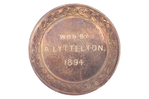 Lot A gold-plated medal presented to Alfred...