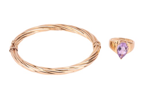 Lot 35 - A 9ct gold amethyst ring and a 9ct gold bangle;...