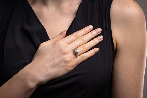 Lot 42 - An Art Deco-style ring, centrally-set with a...