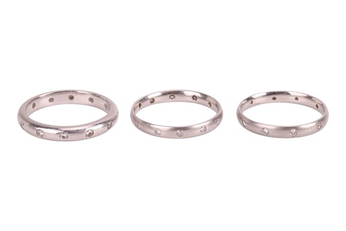 Lot 95 - Three diamond-set eternity bands, the first...
