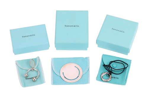 Lot 36 - Tiffany & Co. - A group of silver items to...