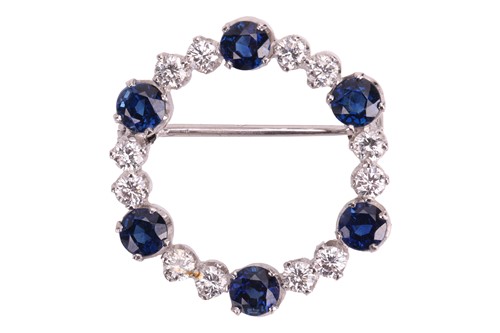 Lot 136 - A sapphire and diamond-set wreath-style brooch,...