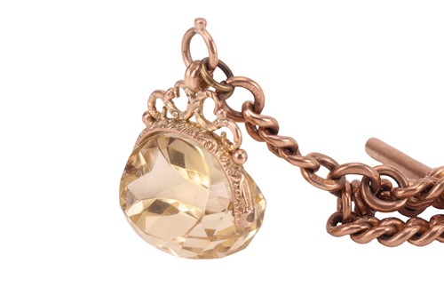 Lot 23 - A 9ct gold watch chain, composed of flat curb...