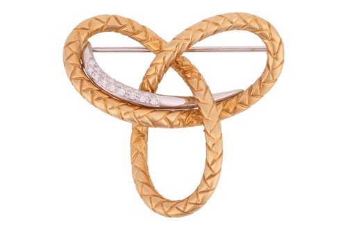 Lot 89 - A diamond-set trefoil knot brooch in 18ct gold,...