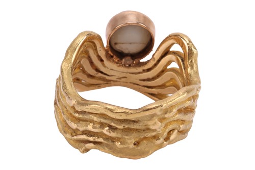 Lot 56 - Grima - An 18ct black opal dress ring;...