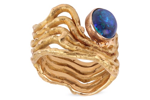 Lot 56 - Grima - An 18ct black opal dress ring;...