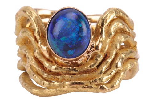 Lot 56 - Grima - An 18ct black opal dress ring;...