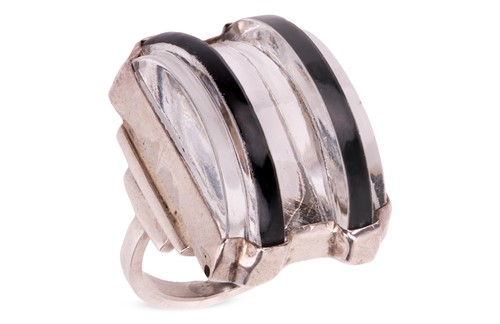 Lot 47 - A paste and black enamel dress ring, featuring...