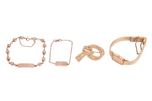 Lot 53 - A Christian Dior open knot brooch in gilt...