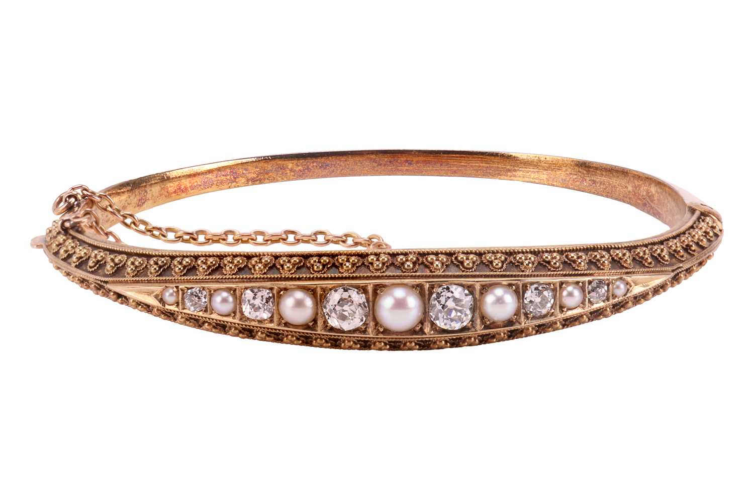 Lot 6 - A Victorian diamond and pearl-set hinged...