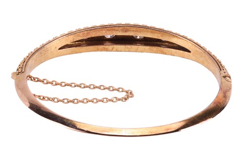 Lot 6 - A Victorian diamond and pearl-set hinged...