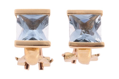 Lot 131 - A pair of topaz ear clips, each comprising a...
